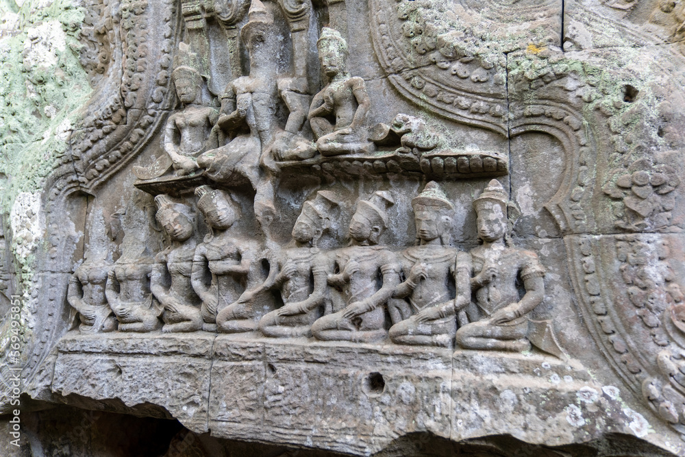 The stone carvings at Ta Prohm Temple. Is an abandoned Buddhist temple in a jungle. Angkor Wat. Cambodia