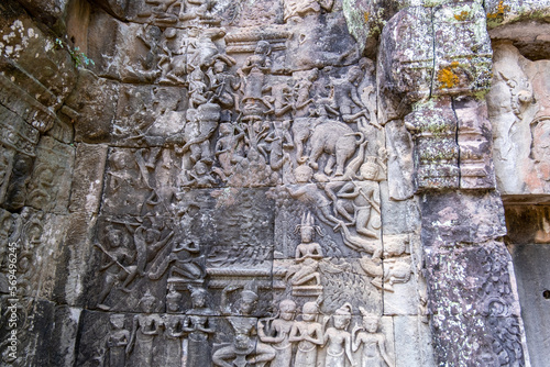 The stone carvings at Ta Prohm Temple. Is an abandoned Buddhist temple in a jungle. Angkor Wat. Cambodia photo
