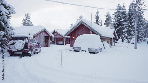 Wallpaper Mural Wooden Cabins And Vehicles Covered In Snow During Winter In Indre Fosen, Norway - wide Torontodigital.ca