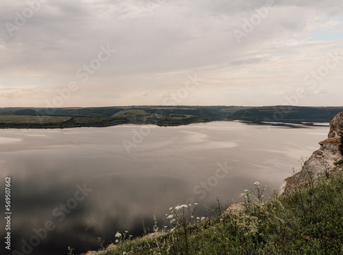 The banks of a large river. A calm smooth water view. The landscape of Bakota Bay on the Dniester river  Ukraine.