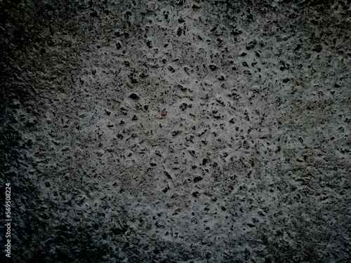 Abstract gray grainy dark vector natural grunge background with concrete wall texture. UHD 4K wallpapers. For screen, desktop, site design, overlay, stencil, banner, styling and polygraph. Vignetka