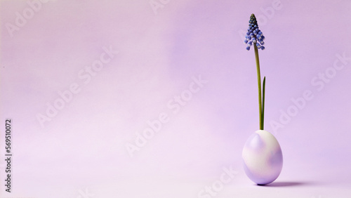 easter decoration in lilac tone, eggs and muscari flowers