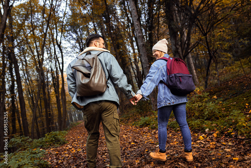 Couple spending time together walking in forest. © Zoran Zeremski