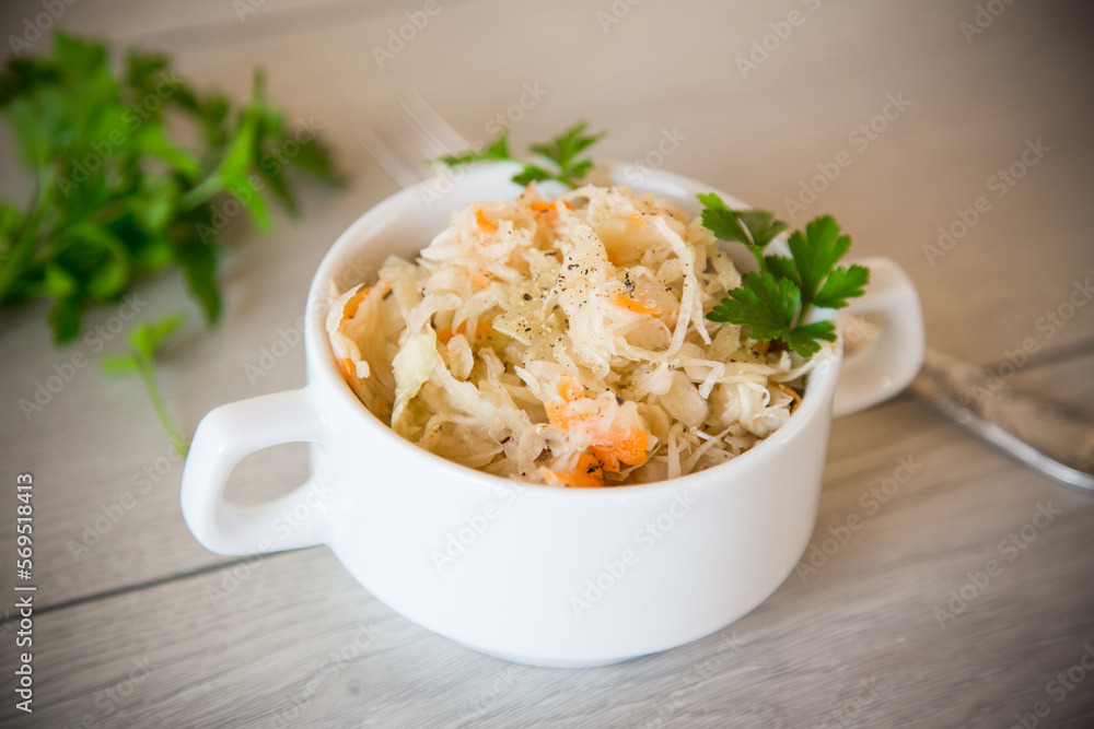 sauerkraut with carrots and spices in a bowl sauerkraut with carrots and spices in a bowl