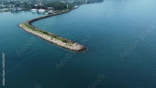Wallpaper Mural Aerial view of breakwater and coastal harbor entrance with calm blue waters Torontodigital.ca