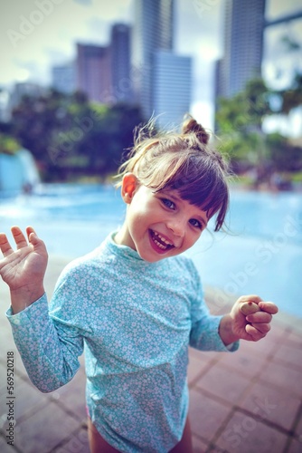 Photography child in kuala lumpur malaysia on the playground twin towers