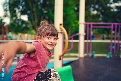 Canvas Print child in kuala lumpur malaysia on the playground twin towers