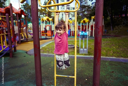 Photography child in kuala lumpur malaysia on the playground twin towers