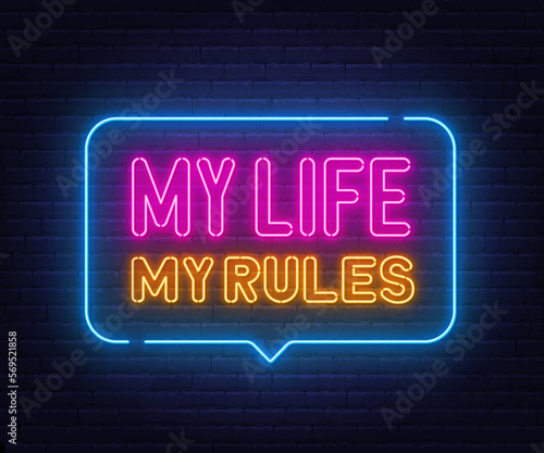 My Life My Rules neon slogan on brick wall background.