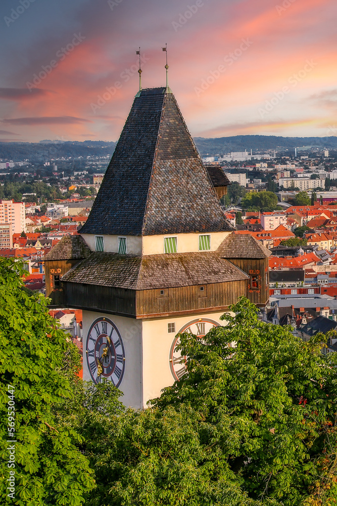 The Clock tower (Uhrturm) on Schlossberg hill in Graz, Austria overlooking the old town, popular travel destination