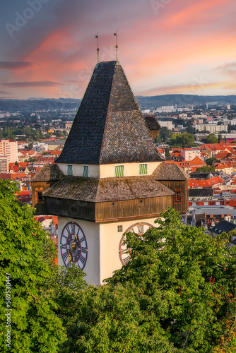 Obraz na płótnie The Clock tower (Uhrturm) on Schlossberg hill in Graz, Austria overlooking the old town, popular travel destination w salonie