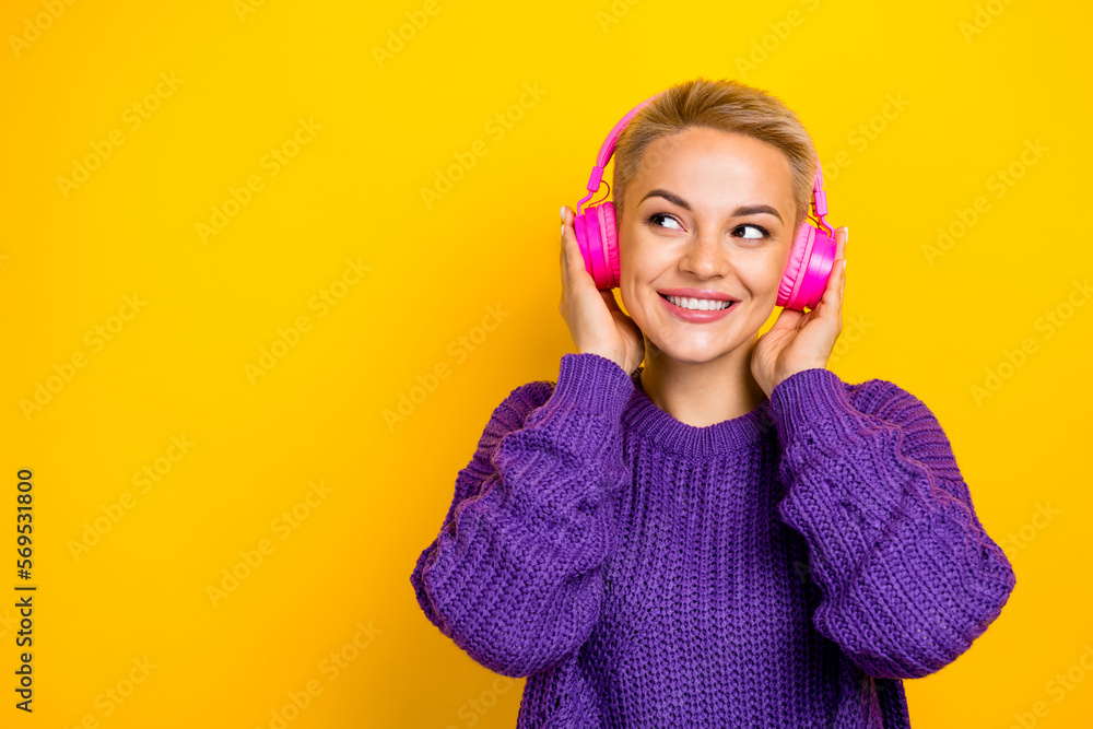 Photo of positive lovely lady wear pink accessory look interesting proposition low price empty space isolated on yellow color background Photo of positive lovely lady wear pink accessory look interesting proposition low price empty space isolated on yellow color background