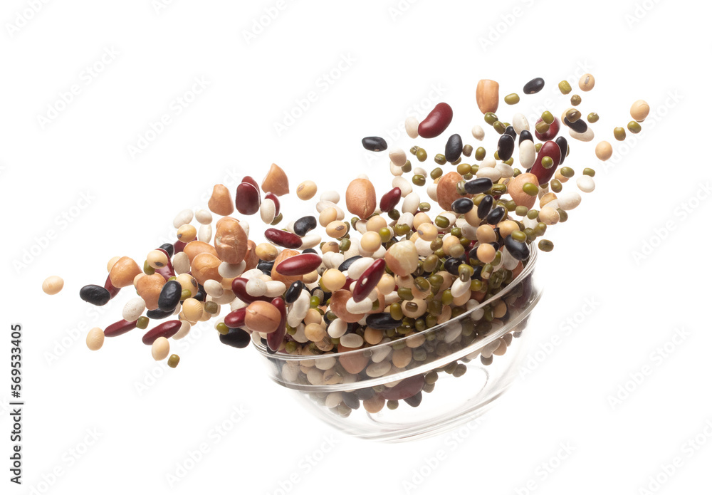 Foto Stock Mix beans fall down explosion, several kind bean float explode in glass bowl. Dried