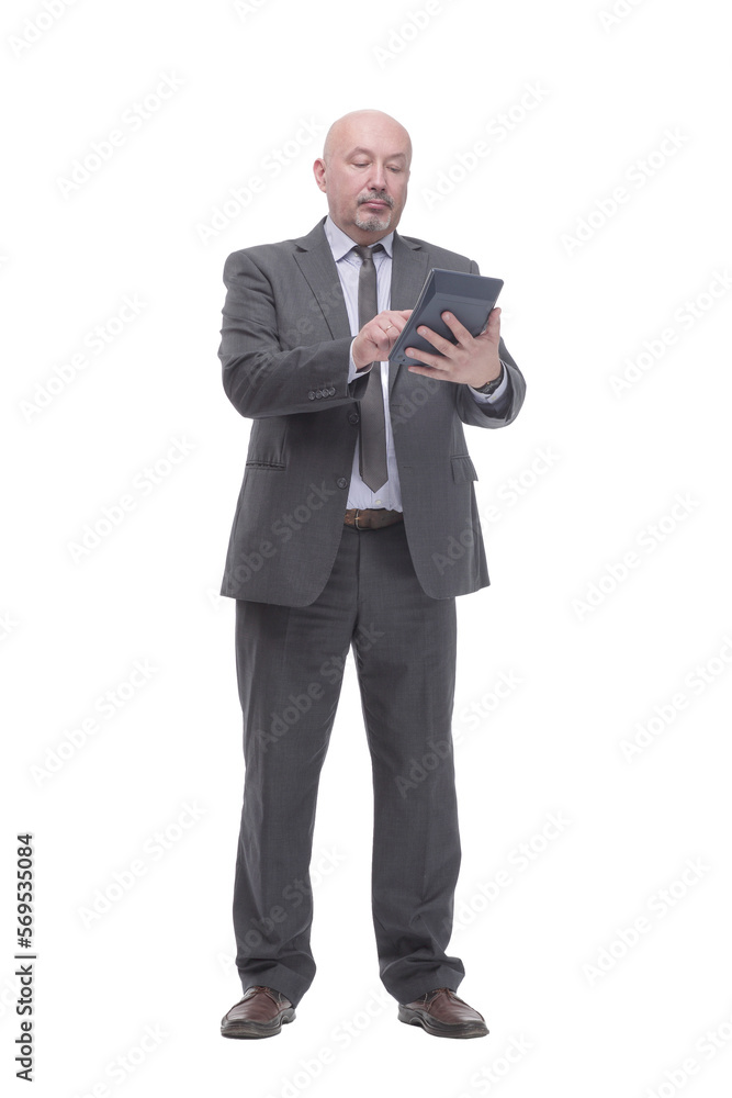 serious business man with a calculator.isolated on a white background. serious business man with a calculator.isolated on a white background.