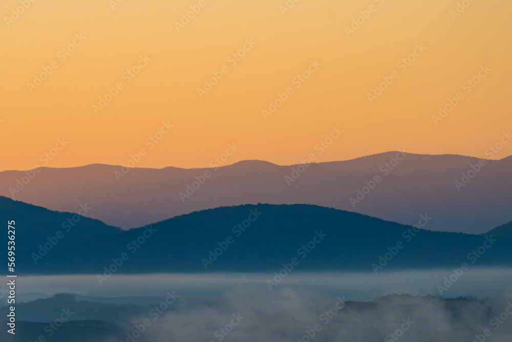 Sunrise over the Mountain Lake and Ridge