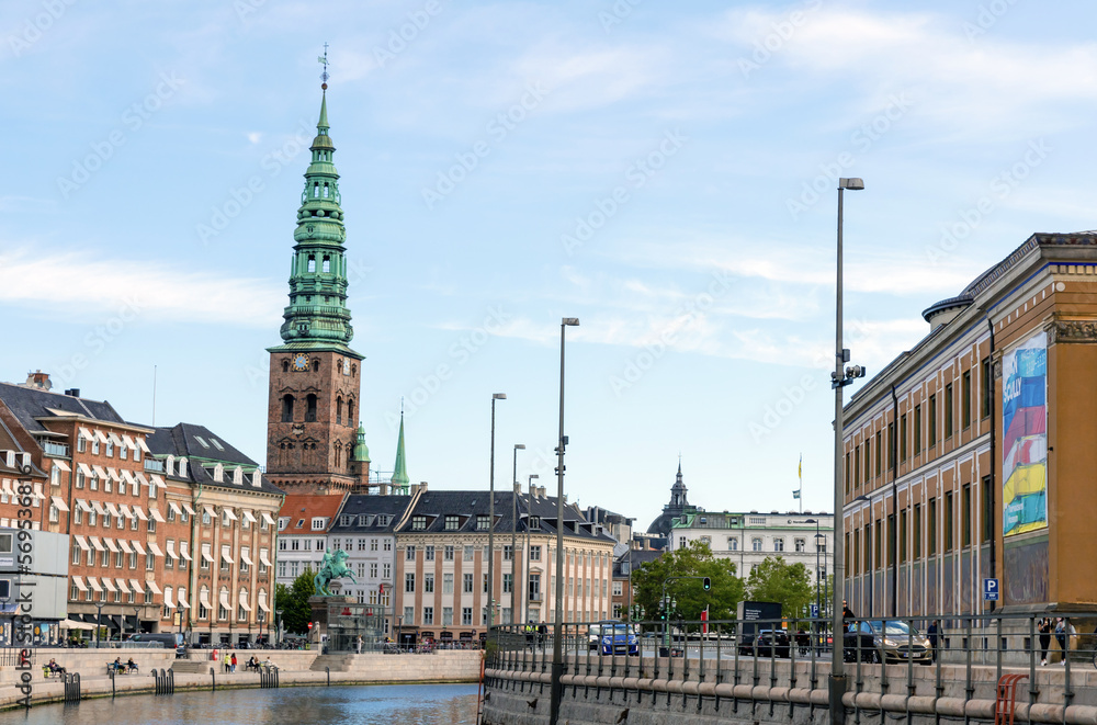 Copenhagen, Denmark - September 8, 2022. View of central Copenhagen. Traditional old houses located around the canal in the city of Copenhagen.