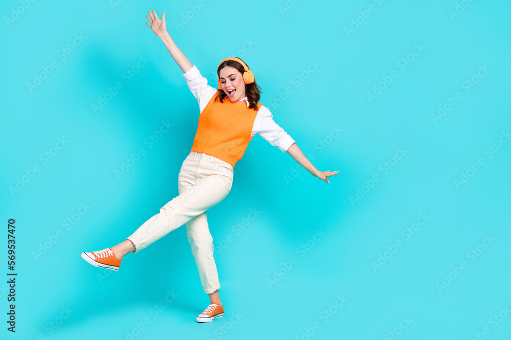 Full body size photo of beautiful school teacher woman relax after classes listen new apple wireless headphones isolated on cyan color background