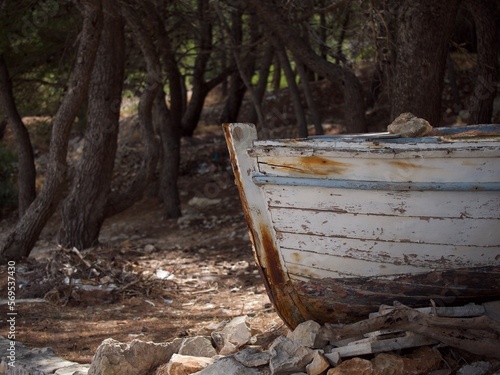 old wooden boat in a pine forest on the island of Čiovo trogir in croatia