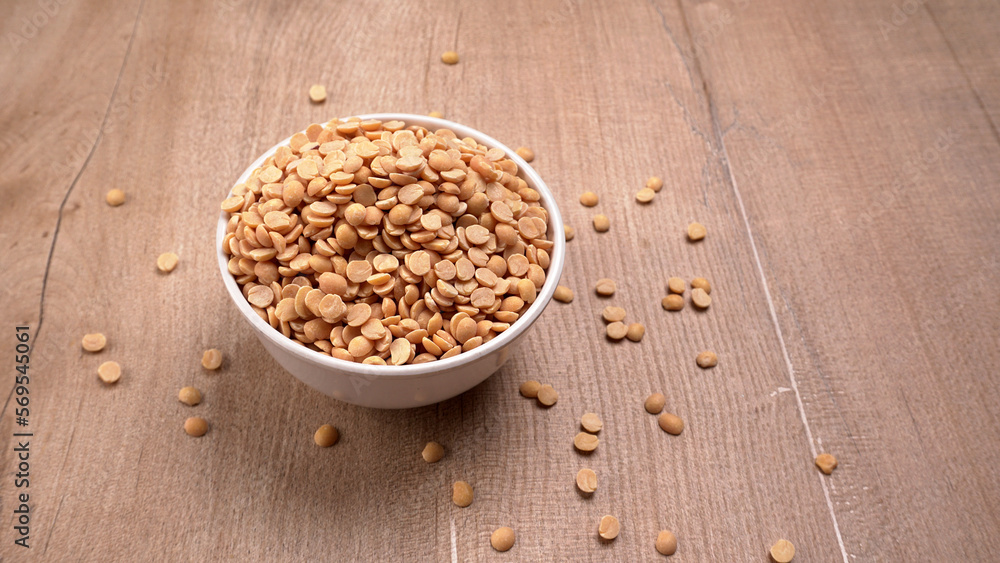 Arhar or Toor dal or Split Pigeon Pea or Yellow lentils or Pulses, top view, India Arhar or Toor dal or Split Pigeon Pea or Yellow lentils or Pulses, top view, India