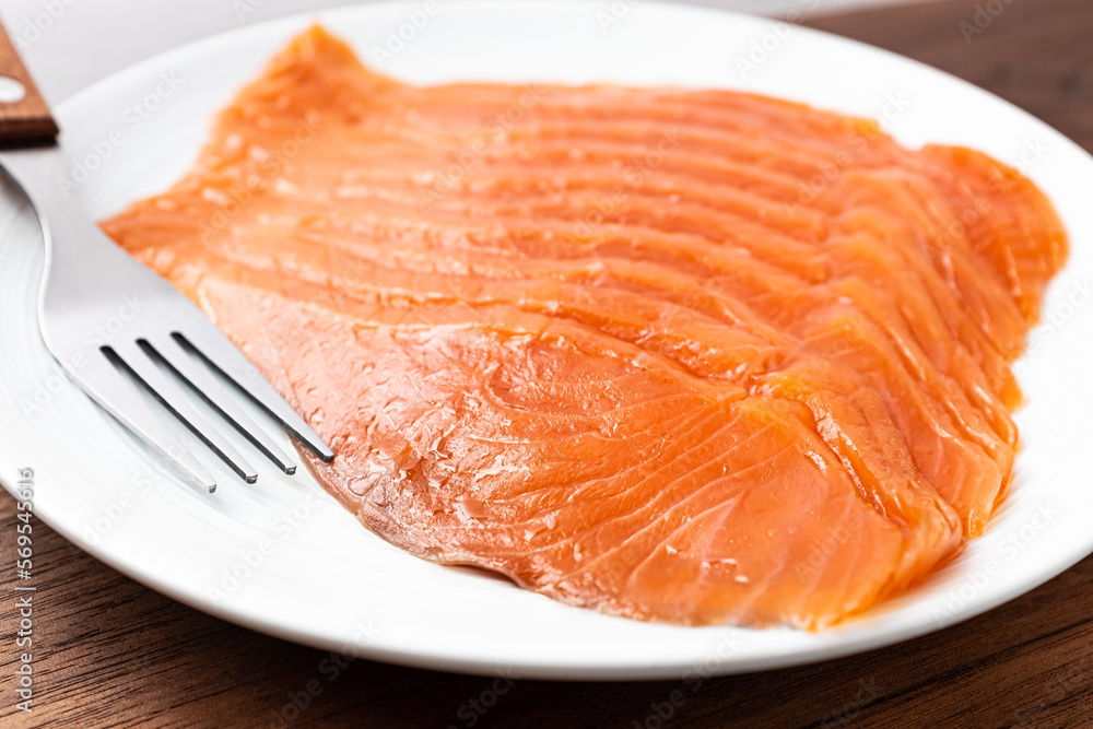 Sliced smoked salmon tender and fragrant Sliced smoked salmon tender and fragrant