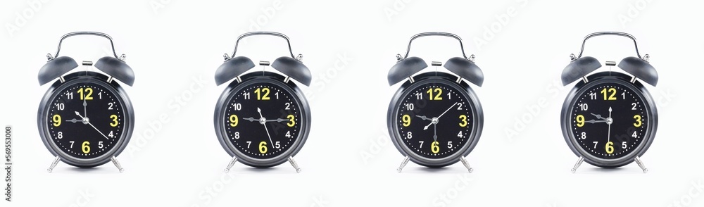 close up of a set of black alarm clocks showing the time; 9, 9.15, 9.30 and 9.45 p.m dan a.m. Isolated on white background - obrazy, fototapety, plakaty 