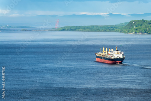 Container ship on Saint-Laurent river in Quebec, Canada