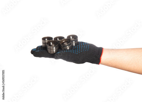 Foto Hydraulic lifters in the hand of a car mechanic minder on a white background, isolate
