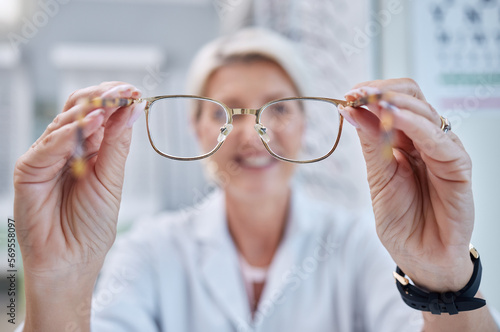 Fotografie Optometry person putting glasses on in client face pov for consultation, frame check and vision test in store