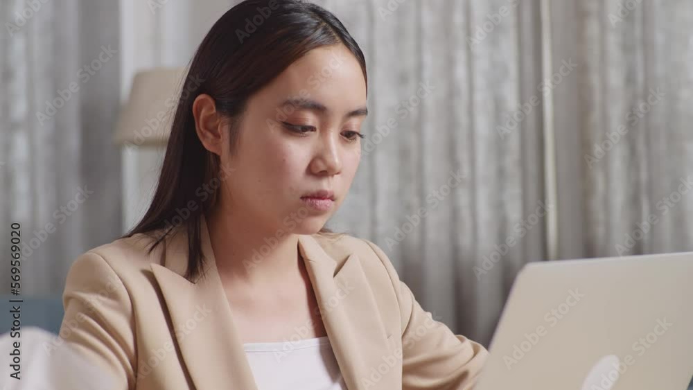 Close Up Of Sick Asian Businesswoman Cough While Working With Laptop In The Living Room At Home
Close Up Of Sick Asian Businesswoman Cough While Working With Laptop In The Living Room At Home