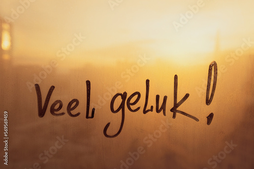 Bild auf Leinwand Lettering Netherlandish language text Veel geluk is Good luck in english message