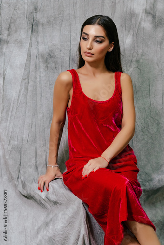 Girl in red dress fashion portrait