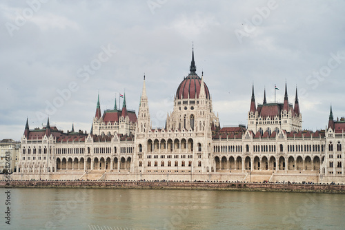 Hungarian Parliament Building in the evening at the Danube river in Budapest, Hungary. High quality photo