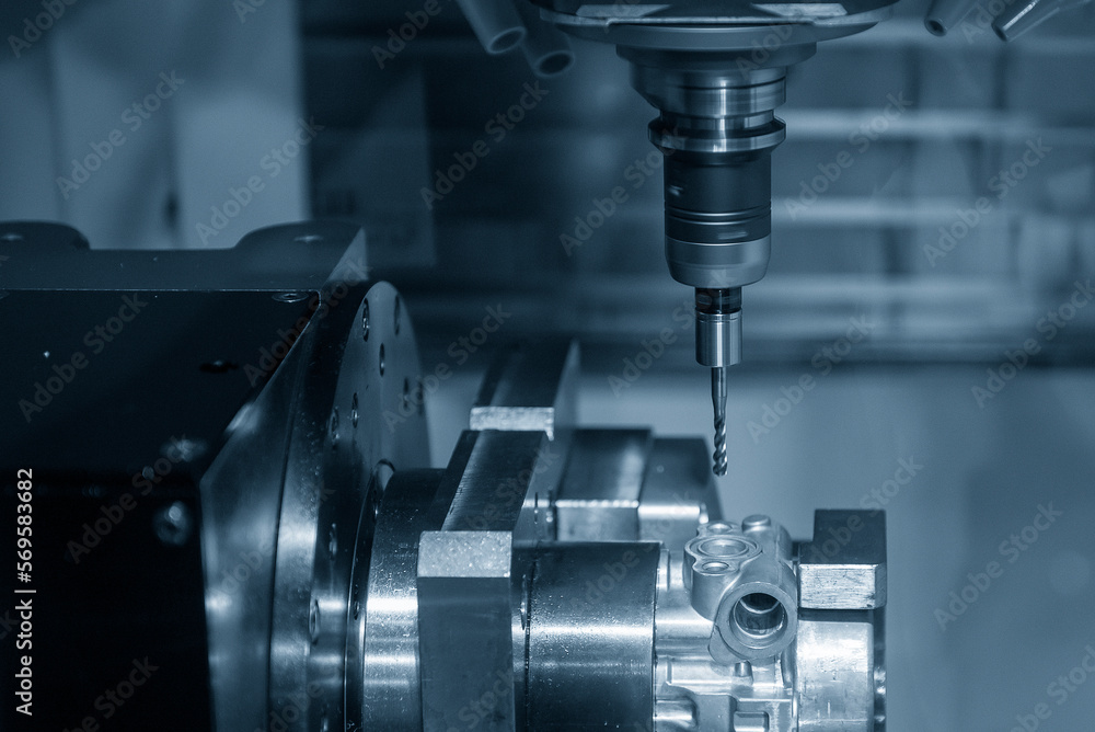 The CNC milling machine tapping process at automotive aluminum part. The CNC milling machine tapping process at automotive aluminum part.