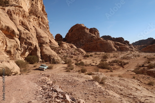 Abandoned vehicle, car on the desert hiking trail from Little Petra to the Monastery