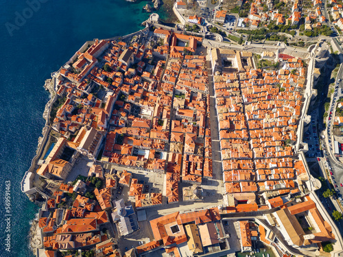 Aerial drone view of the Old historic city of Dubrovnik in Croatia, UNESCO World Heritage site. Famous tourist attraction in the Adriatic Sea. Fortified old city. Tourism and travel to Croatia.
