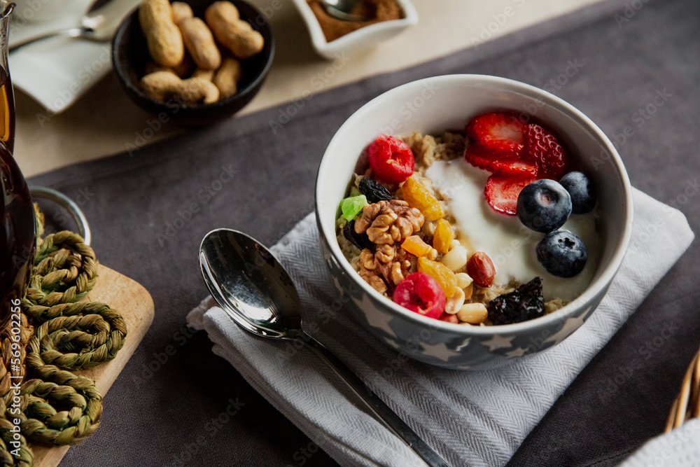 breakfast set, oatmeal with berries and yogurt, black tea with roses, bread breakfast set, oatmeal with berries and yogurt, black tea with roses, bread