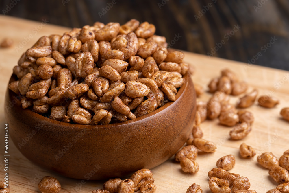 Grain wheat covered with a thin layer of chocolate Grain wheat covered with a thin layer of chocolate