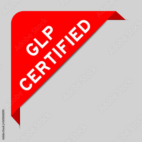 Red color of corner label banner with word GLP (Abbreviation of Good laboratory practice) certified on gray background