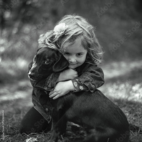 Photos Little girl with a dog