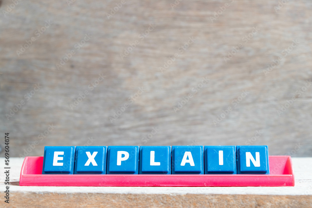 Tile alphabet letter with word explain in red color rack on wood ...