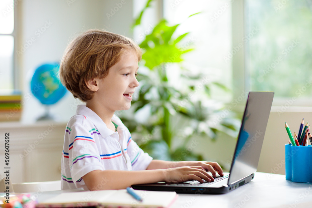 Online remote learning. School kids with computer. Online remote learning. School kids with computer.