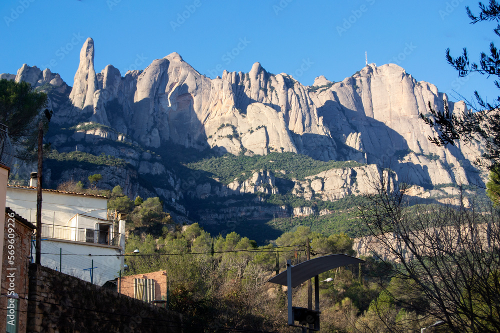 Walk through the mountain of Montserrat in Barcelona during a winter morning and a sunny day.