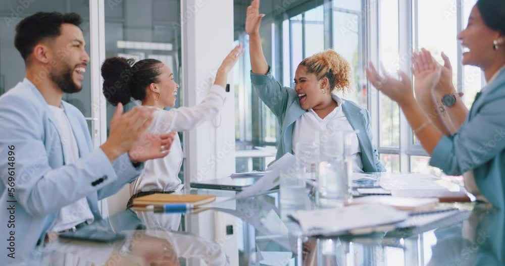 Success celebration, finance team and winning with documents or paper in air for success. Diversity men and women high five or applause target goals, profit development and teamwork in office meeting Success celebration, finance team and winning with documents or paper in air for success. Diversity men and women high five or applause target goals, profit development and teamwork in office meeting