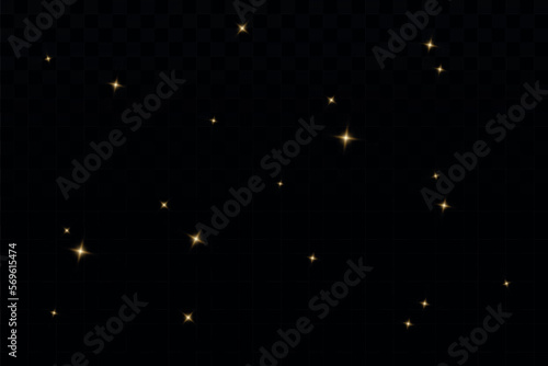 Golden glitter.Light effect.Glittering particles background. Gold dust on a transparent background.