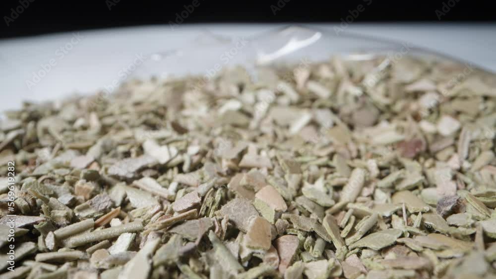Green tea made from olive tree leaves. Dried crushed leaves. Dolly macro slider. Green tea made from olive tree leaves. Dried crushed leaves. Dolly macro slider.