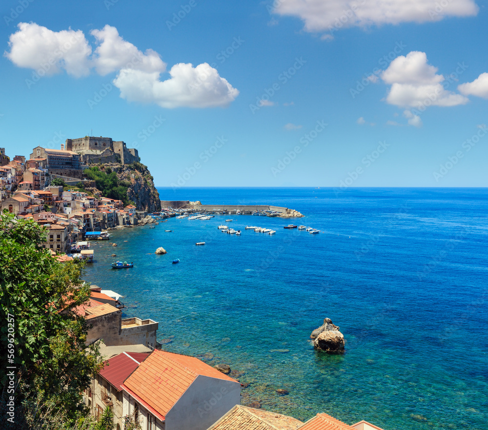 Summer Tyrrhenian Sea coast and beautiful Scilla town view , Calabria, Italy. People unrecognizable.