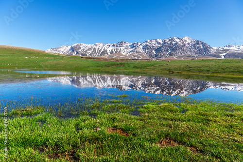 Spring thaw with lake reflection on the Campo Imperatore Plateau, Gran Sasso National Park, Apennines, Abruzzo, Italy, Europe