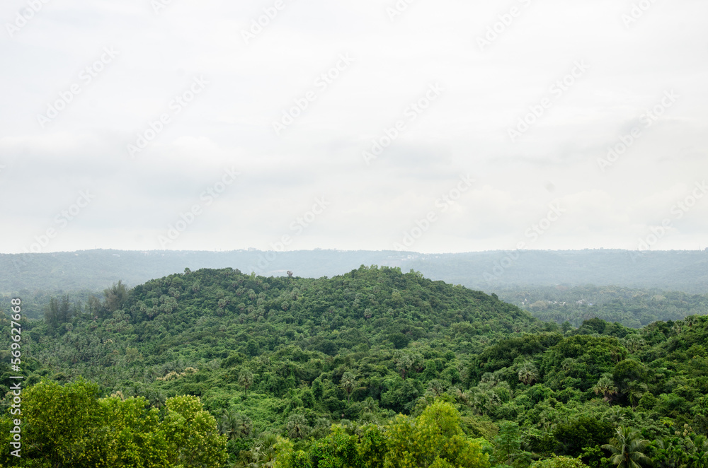Serene view of Sanoor Padav Hills, Mangalore, India during the monsoon season.