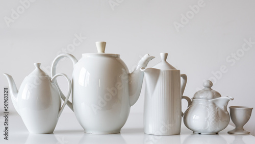 white ceramic jug and cup