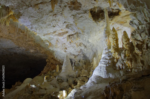 stalactites in underground cavern, caves de Chorange, Isere, France photo